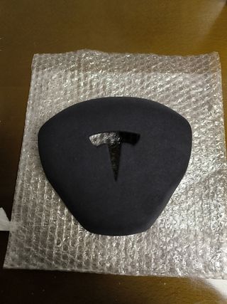 Tesla adorno para el volante.