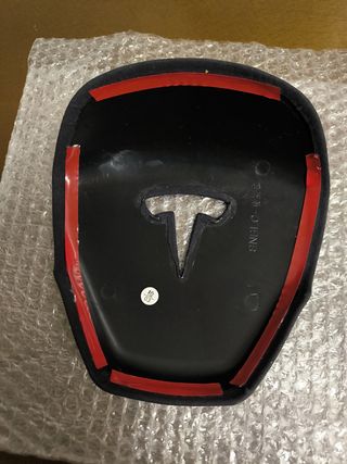 Tesla adorno para el volante.