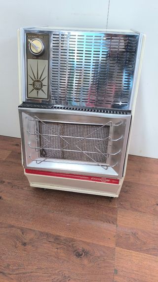 ESTUFA DE GAS ANTIGUA CALIENTA BASTANTE