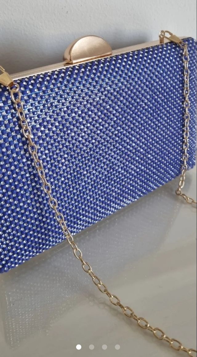 Rebajado! Clutch bolso de mano Fiesta.