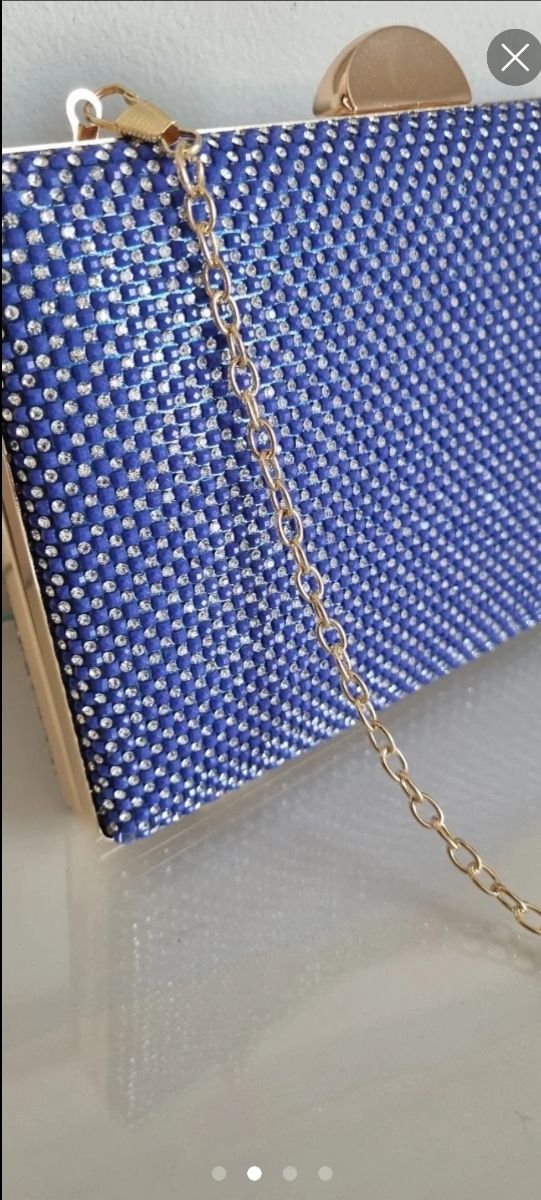 Rebajado! Clutch bolso de mano Fiesta.