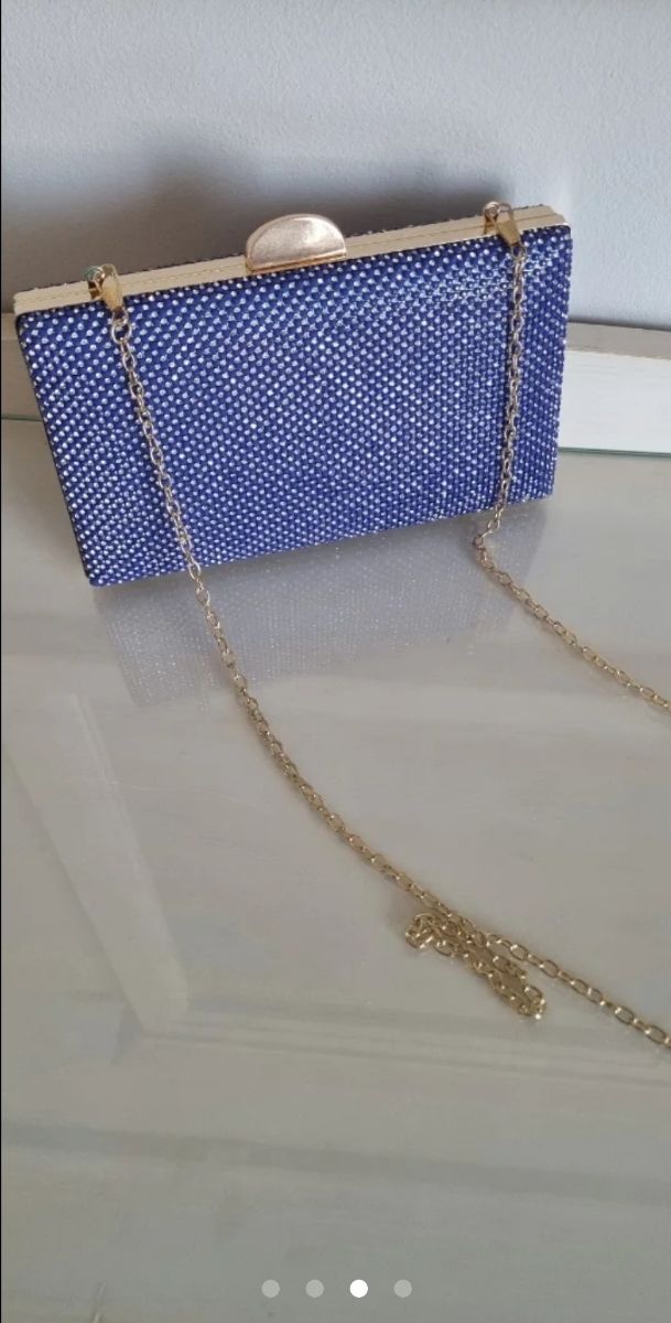 Rebajado! Clutch bolso de mano Fiesta.