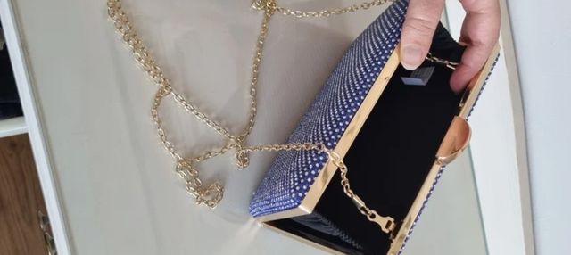 Rebajado! Clutch bolso de mano Fiesta.