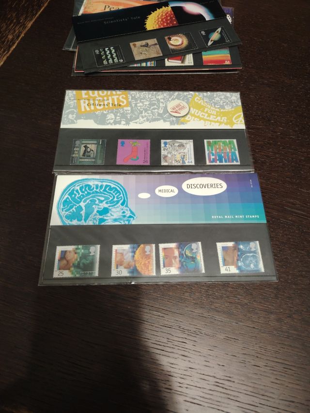 10 folder francobolli inglesi