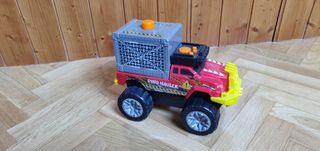 Camión con dinosaurio Dino Hauler