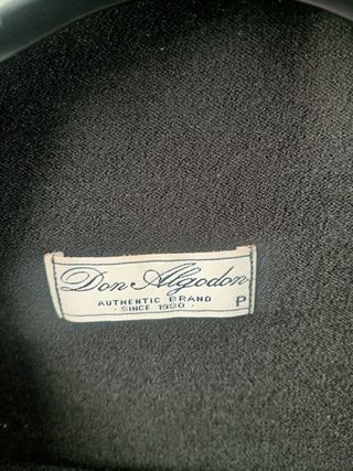 Top punto sin mangas negro