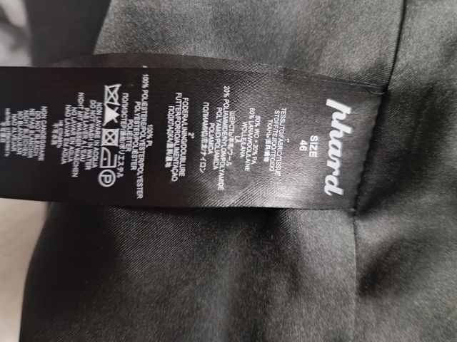 Cappotto con collo di pelliccia 