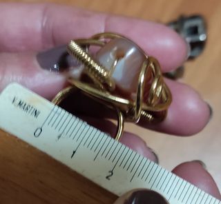 Anello dorato con pietra marrone misura piccola