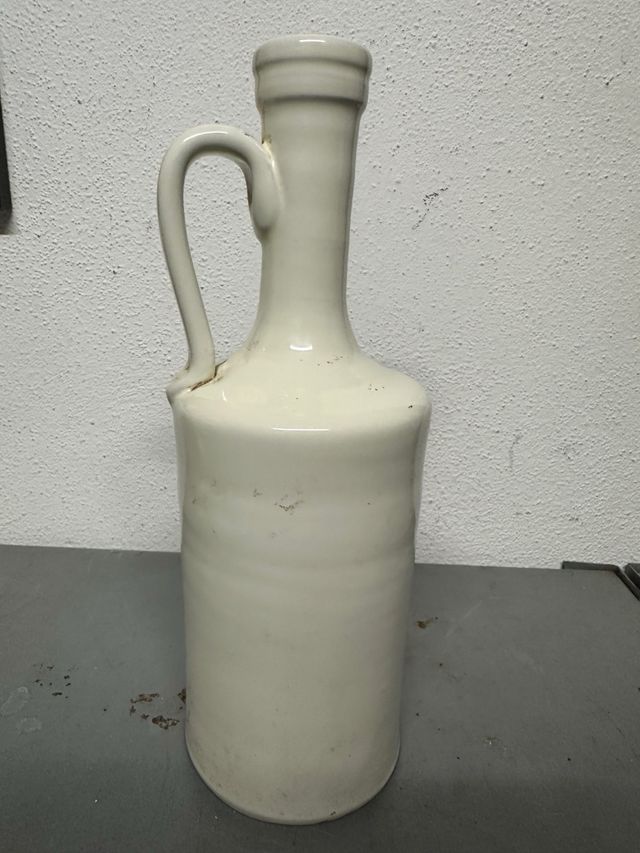 Bottiglia terracotta smaltata vintage