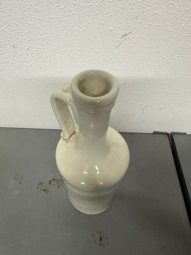 Bottiglia terracotta smaltata vintage