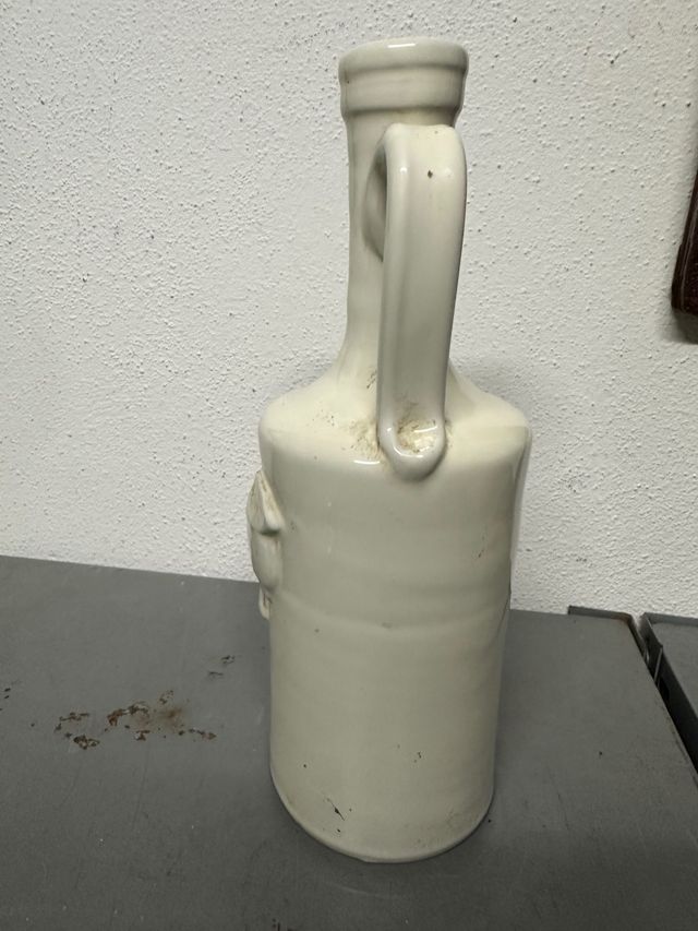 Bottiglia terracotta smaltata vintage