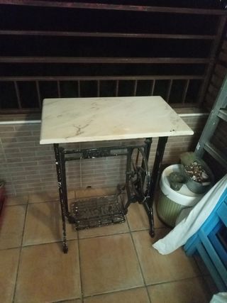 Mueble de patas de maquina de coser