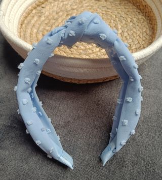 Diadema azul plumeti Sinsay seminueva