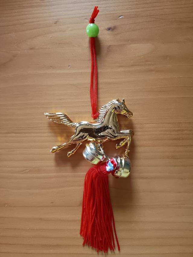 Amuleto colgante caballo