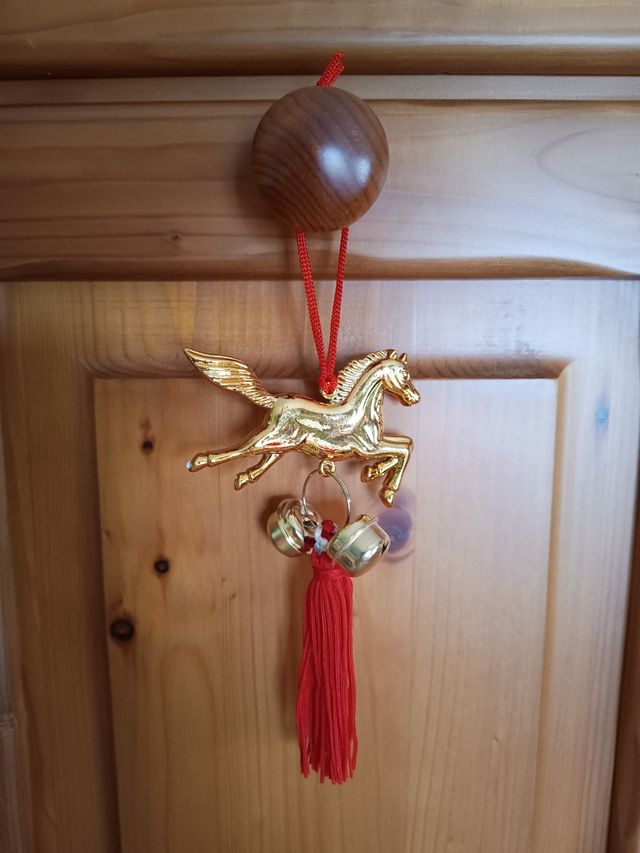 Amuleto colgante caballo