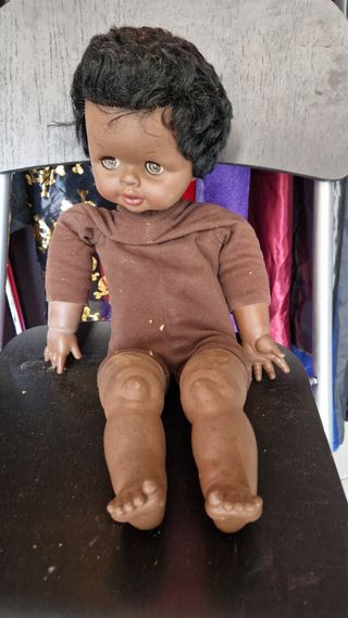 Bambolotto nero con dischetto