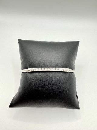 Brazalete caña de oro blanco de 18k