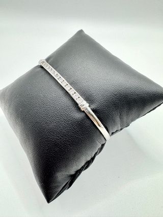 Brazalete caña de oro blanco de 18k