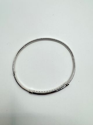 Brazalete caña de oro blanco de 18k