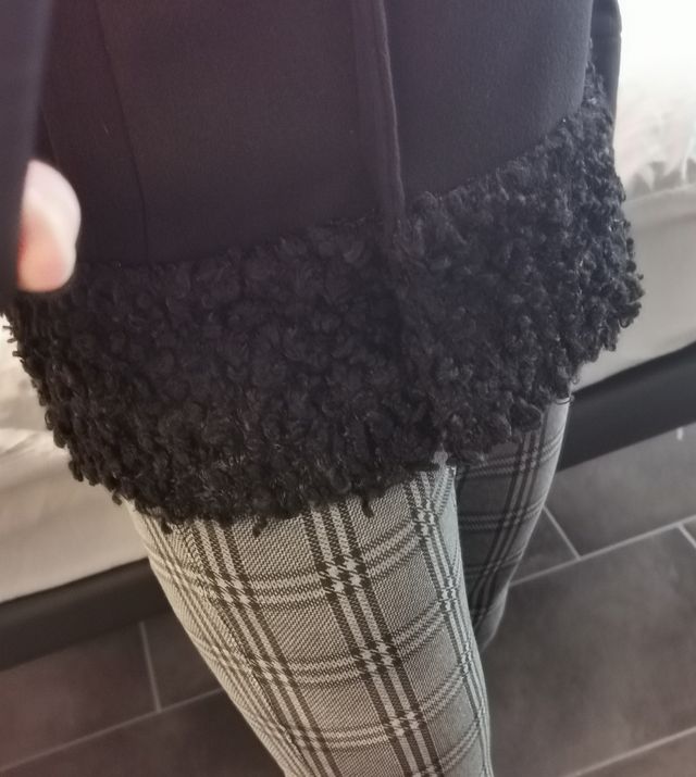 Cappotto donna di colore nero. 