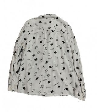 Camisa blanca de gatos de C&A