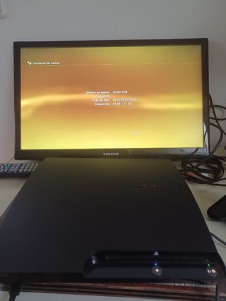 PS3 con 2 mandos y 10 juegos