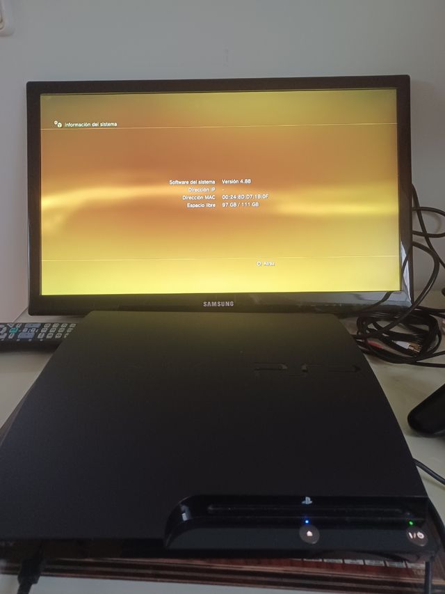 PS3 con 2 mandos y 10 juegos