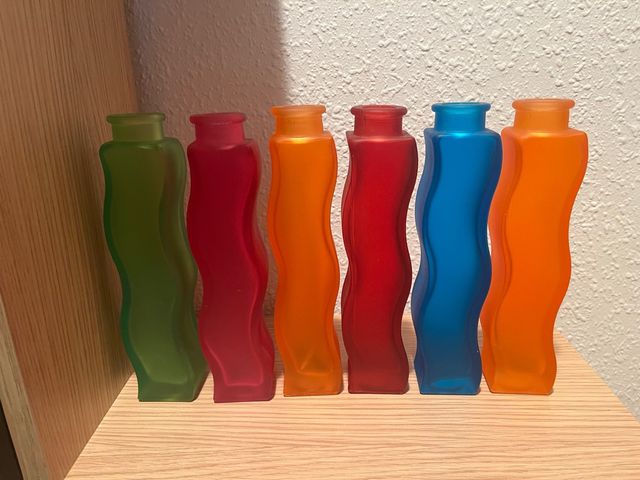 Cojunto de jarrones colores.