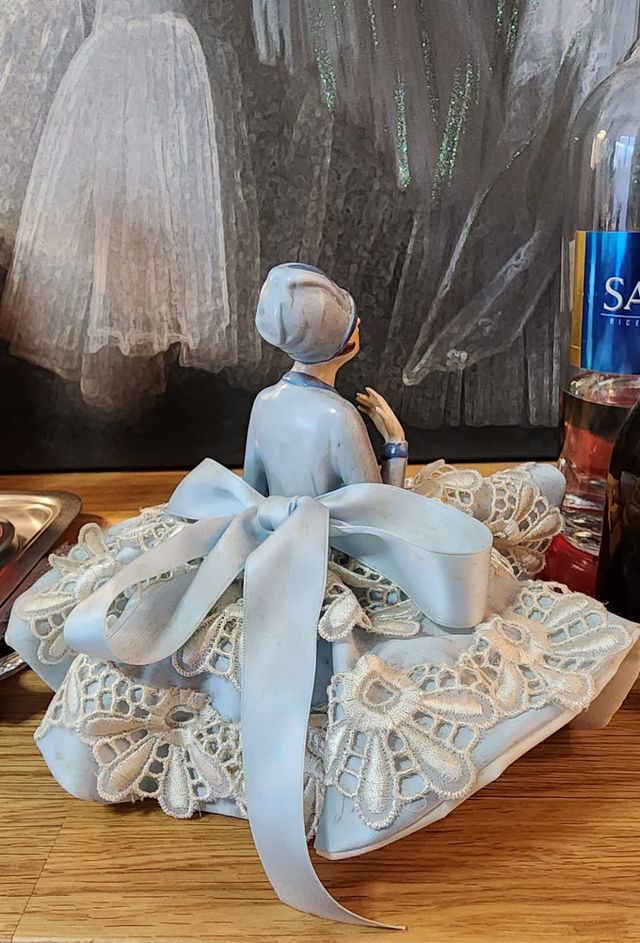 Antica figura portaspilli