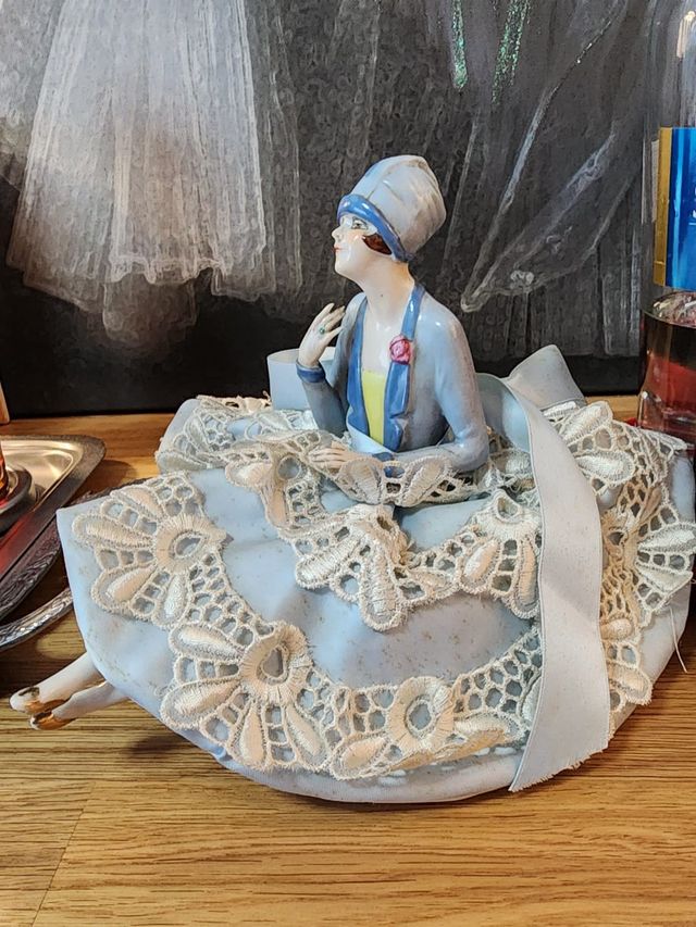 Antica figura portaspilli