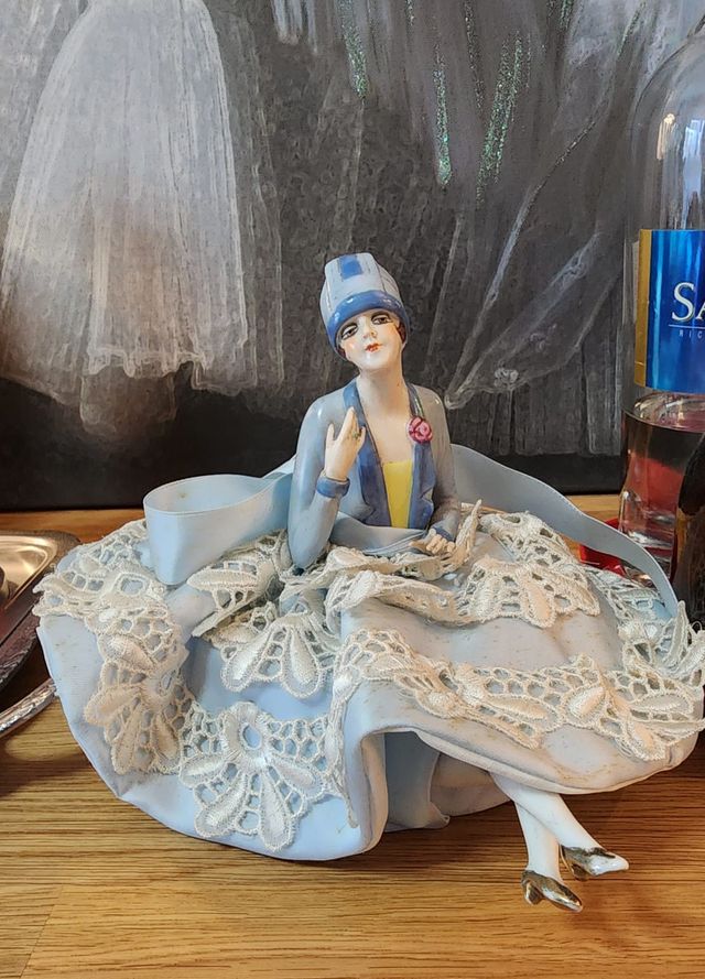 Antica figura portaspilli