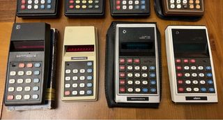 8 Commodore CBM handheld calculators Lot
