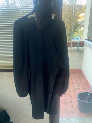 Vestito impermeabile con ampie maniche