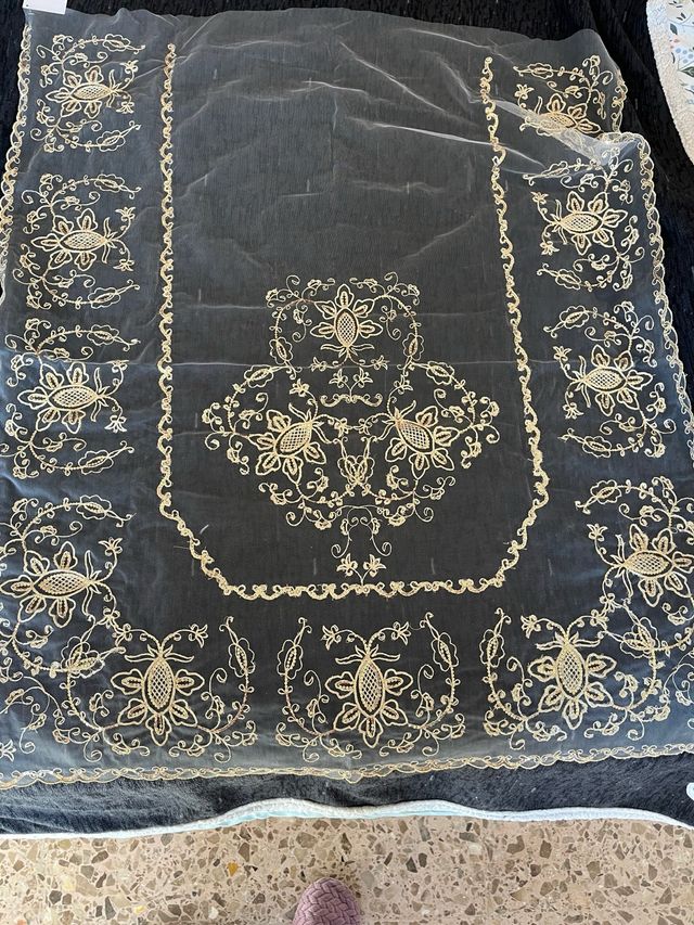 Manteltas en oro 110cm