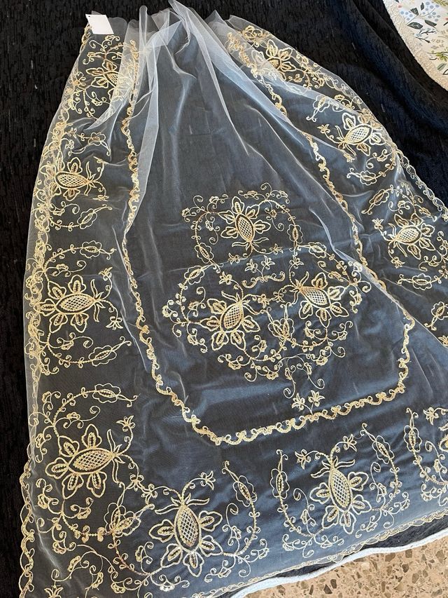 Manteltas en oro 110cm