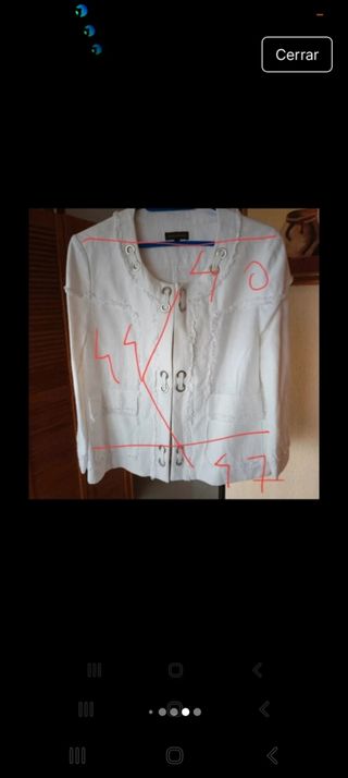 Chaqueta de Adolfo Domínguez.  En blanco