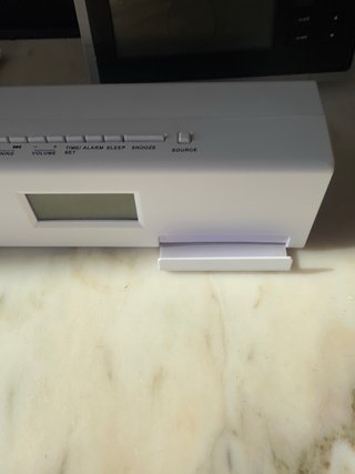 Reloj radio despertador