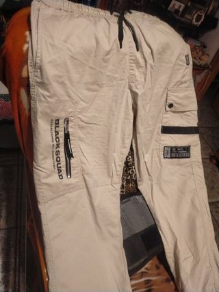 Pantalones joggers,crema, talla L.