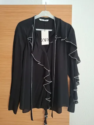  Blusa volantes