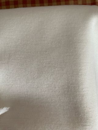 Trozos de tela crema de punto