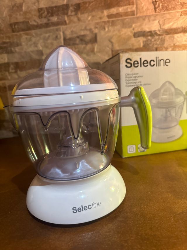 Exprimidor electrico selecline