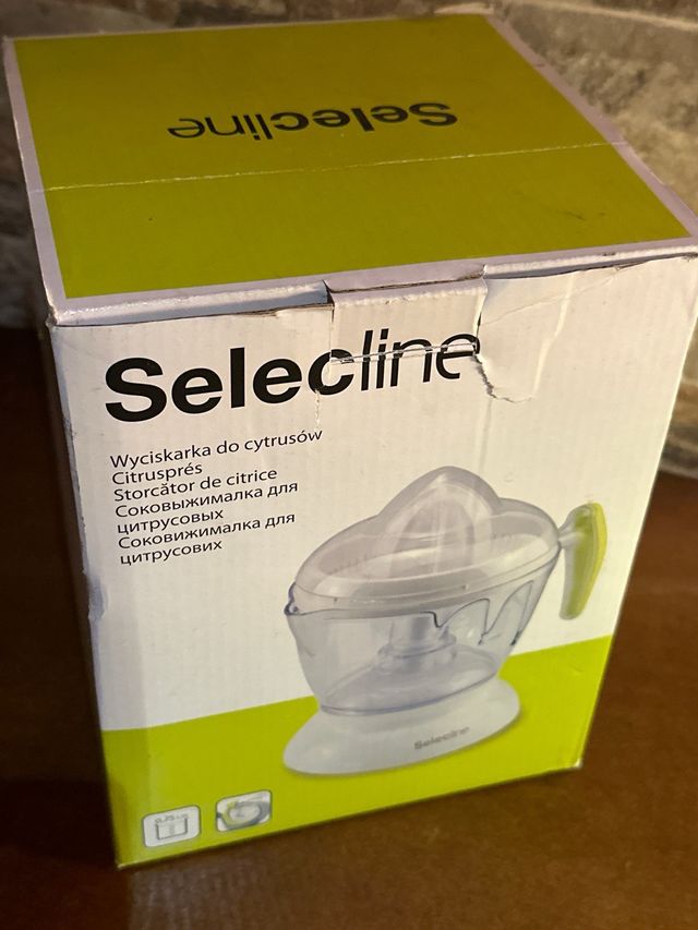 Exprimidor electrico selecline