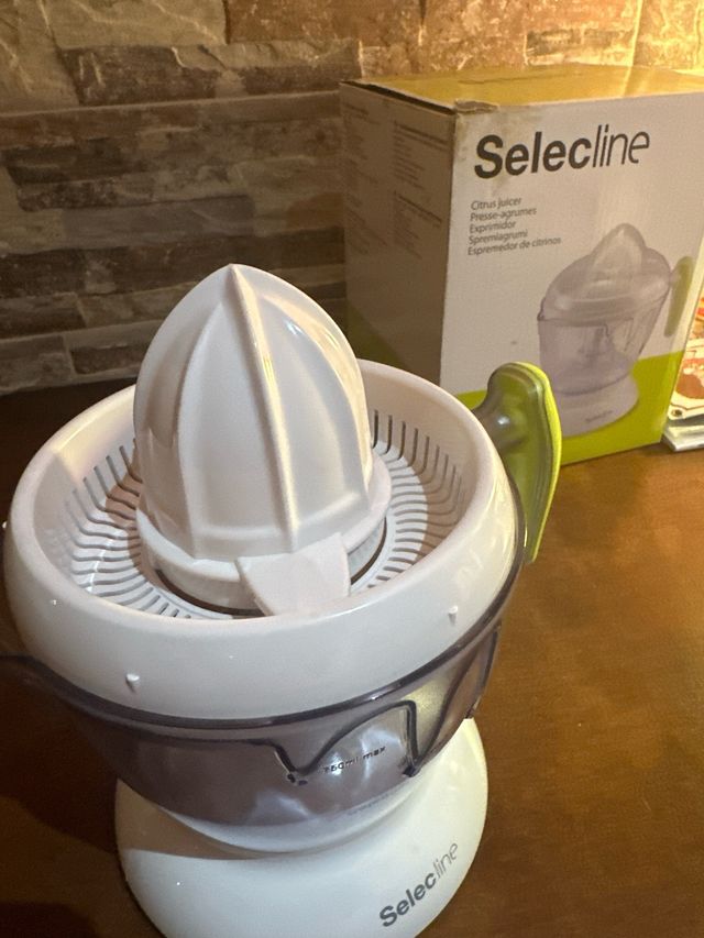 Exprimidor electrico selecline