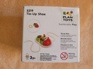 Zapato de juguete para atar cordones