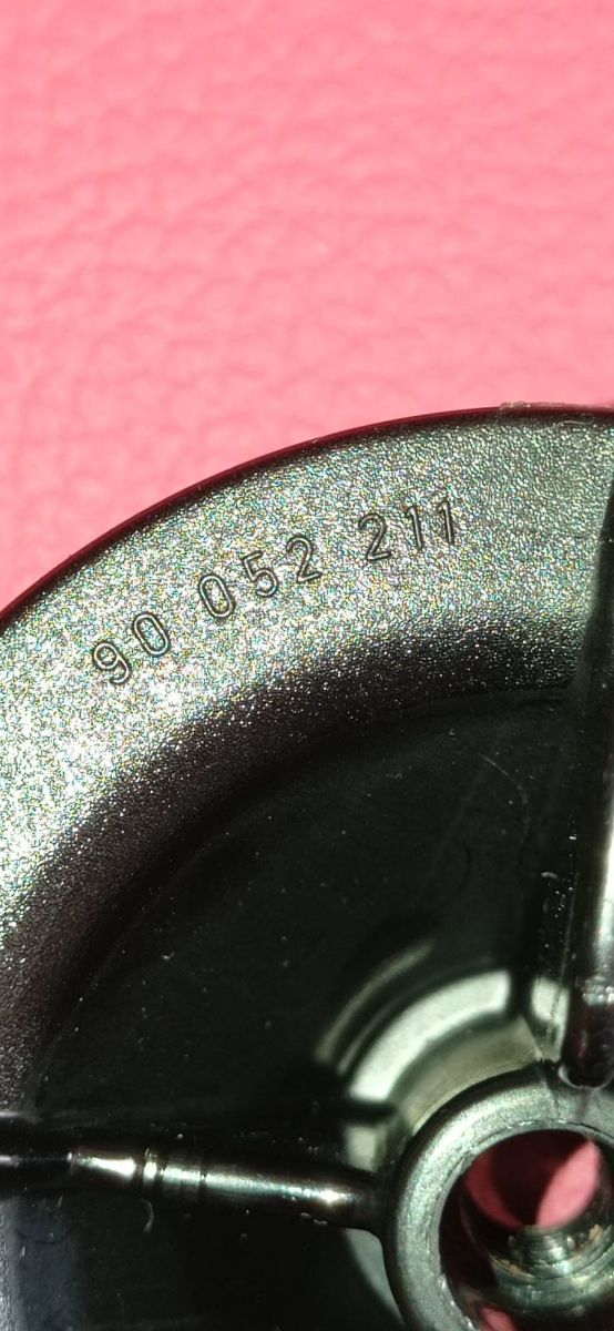 Tuerca rueda repuesto GM. Original. Chevrolet, Cor