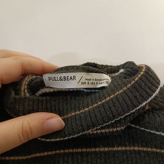 Jersey de punto de cuello alto a rayas