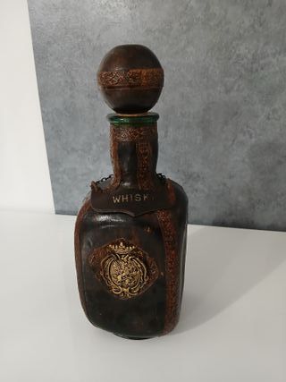 BOTTIGLIA VINTAGE DI VETRO RIVESTITA IN PELLE PER