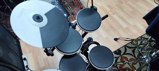 Batería electrónica Roland TD-1K + sillín MDTJR 