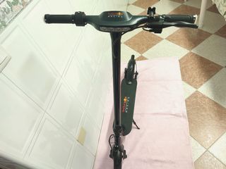 Patinete Red bull de 3 meses.