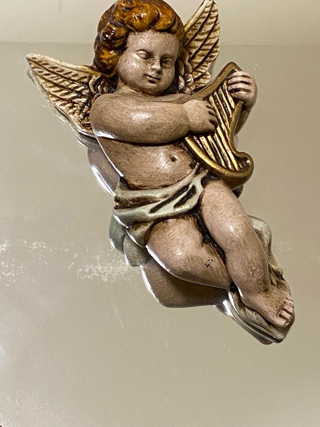 Espejo grande vintage con querubines